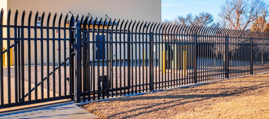 High-security steel fence installation protecting critical infrastructure.