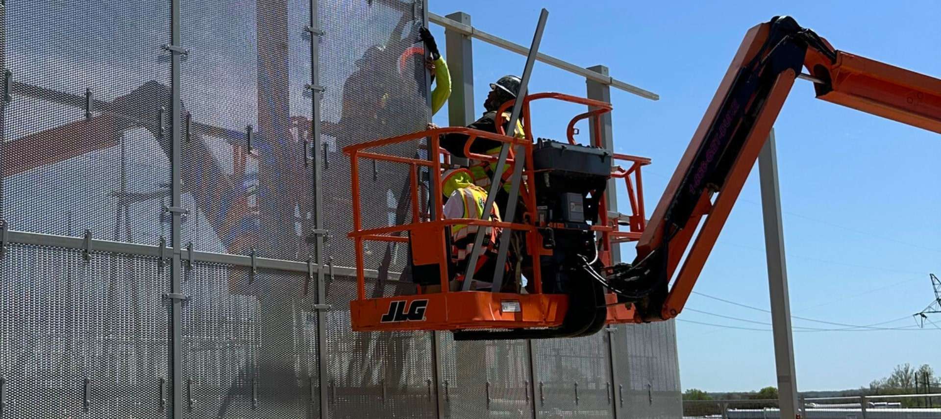 Security Constructors team installing high-security fencing on-site.
