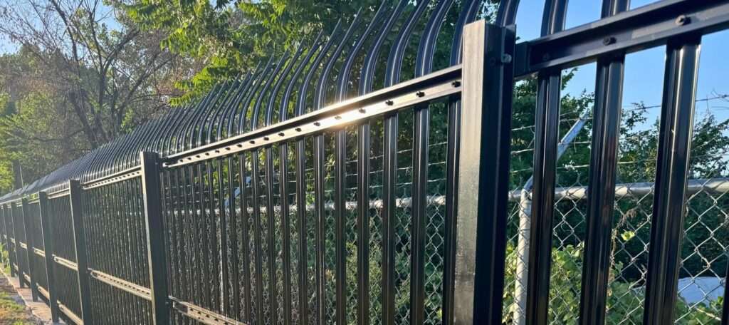 High-security fence inspected and maintained for long-term protection.